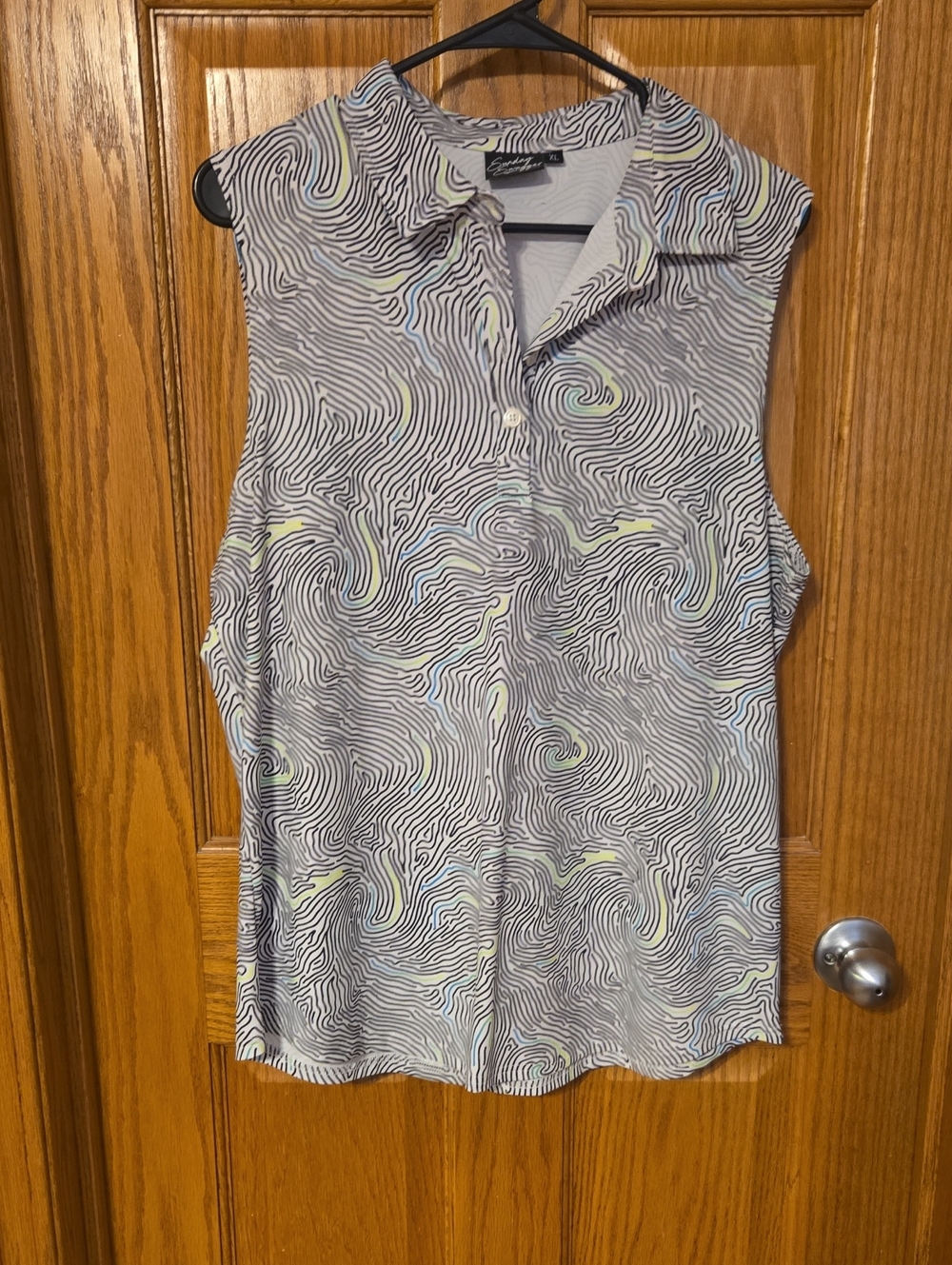 Sleeveless Collared Blouse in White with Swirl Print